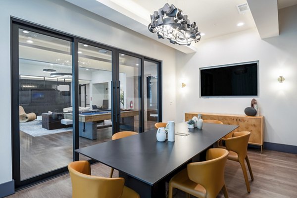 Meeting room with modern amenities at The International at Valley Ranch Apartments