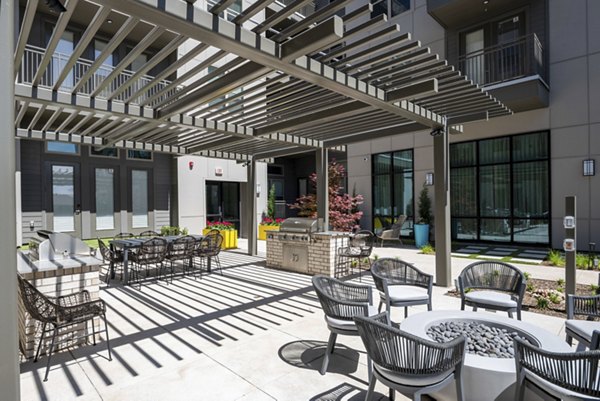 The International at Valley Ranch: Cozy fire pit area at luxury apartments in peaceful surroundings