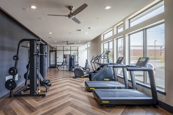 fitness center at The International at Valley Ranch Apartments