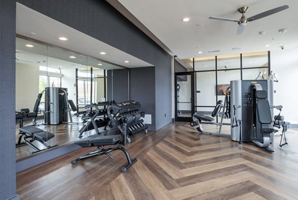 fitness center at The International at Valley Ranch Apartments