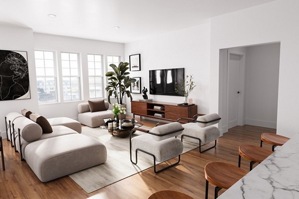 Spacious living room featuring modern furnishings at Shoregate Apartments in luxury Greystar community