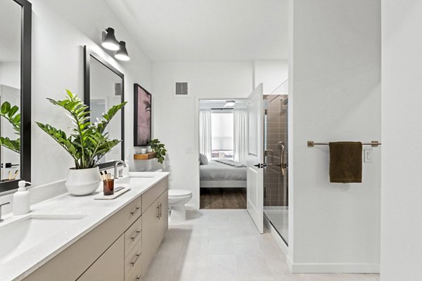 Bathroom with modern fixtures and sleek design at Soluna Apartments