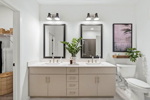 Bathroom featuring modern fixtures at Soluna Apartments