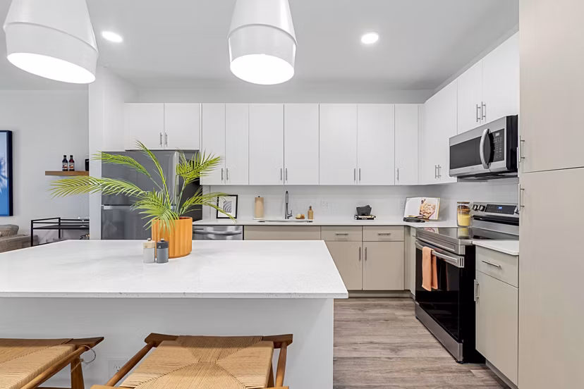 Modern kitchen with stainless steel appliances at Soluna Apartments