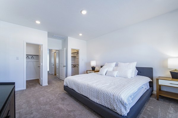 Balcara at Meridiana Homes: Modern bedroom with stylish decor and ample natural lighting, available in luxury apartments