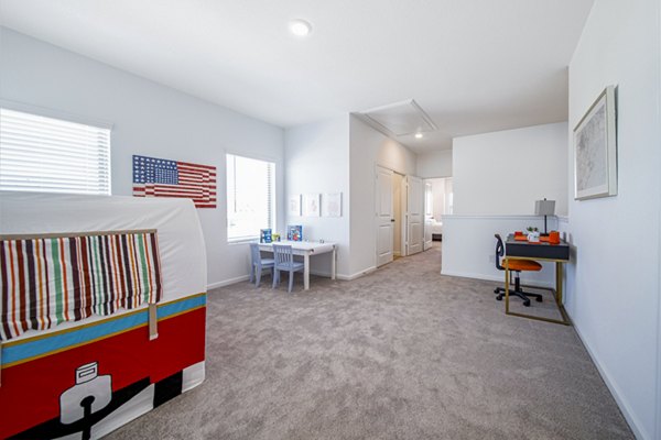 Cozy home office with natural light at Balcara at Meridiana Homes