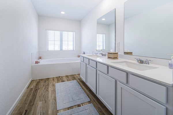 Balcara at Meridiana Homes: Modern bathroom with elegant fixtures and sleek design in luxury apartments