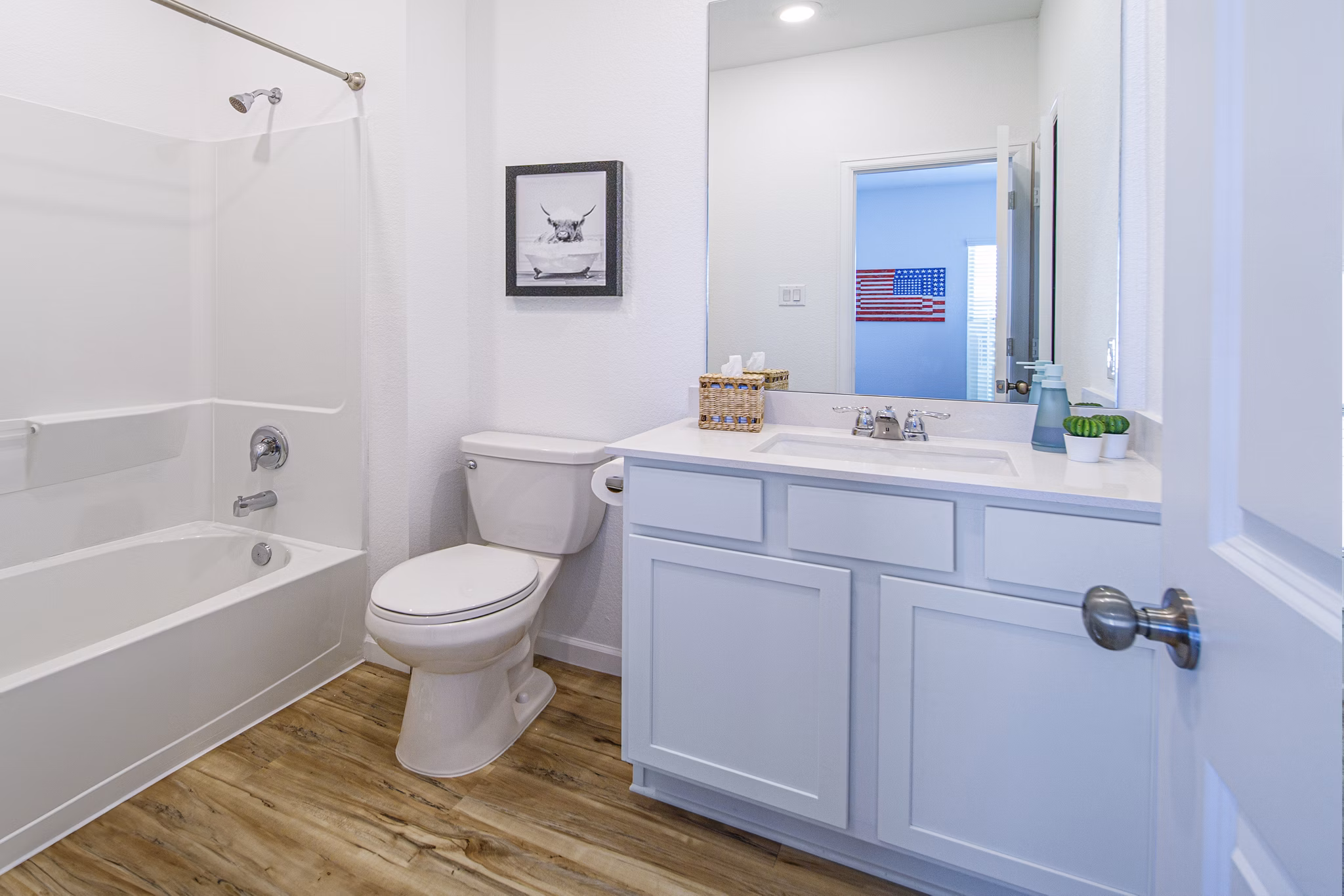 Balcara at Meridiana Homes: Modern bathroom with dual sinks and stylish fixtures in a luxury apartment