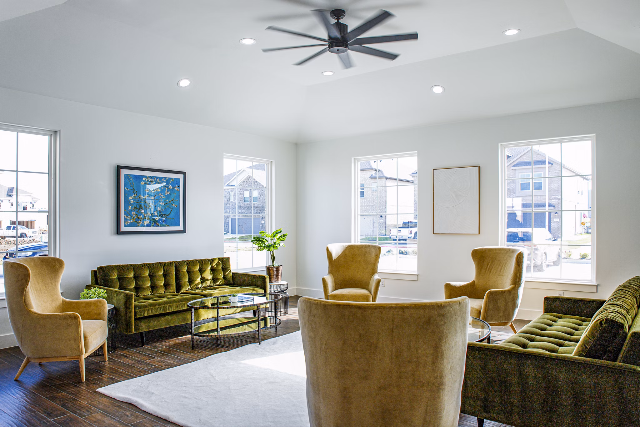 Clubhouse featuring modern design and ample seating at Balcara at Meridiana Homes