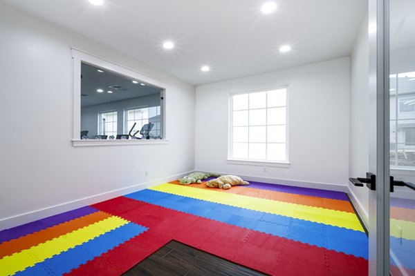 Day care center with vibrant play area at Balcara at Meridiana Homes