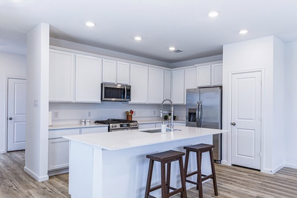 Kitchens Perfect for Entertaining with Modern Appliances at Balcara at Meridiana Homes Apartments