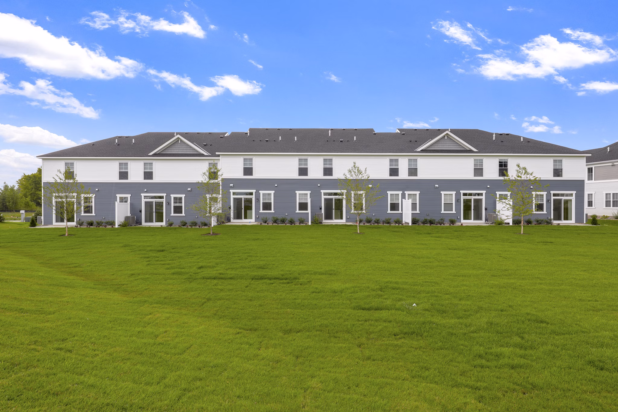 Bentley Village: Elegant of luxury apartments surrounded by lush greenery in Naples, Florida
