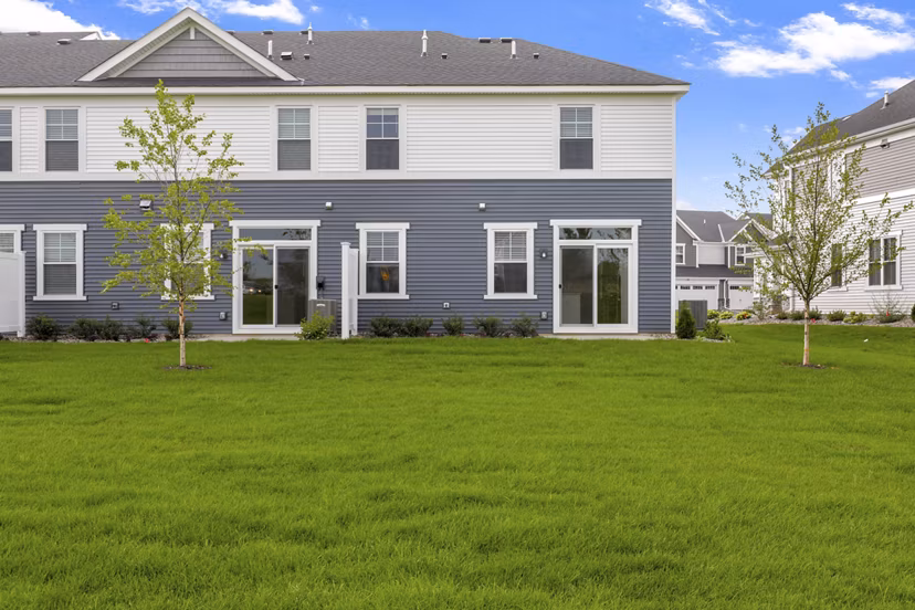 Bentley Village Apartments: Elegant view of luxury apartments in Naples, featuring lush landscaping and modern architectural design