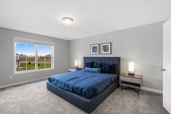 Bedroom featuring elegant design and modern furnishings at Bentley Village Apartments