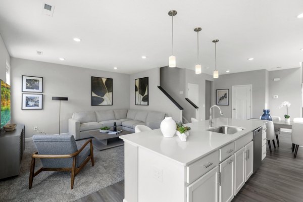 Elegant dining room with modern furnishings at Bentley Village Apartments