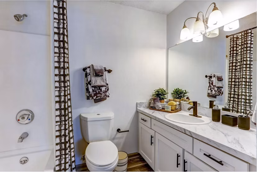 Bathroom with modern fixtures and sleek design at The Oakley Apartments