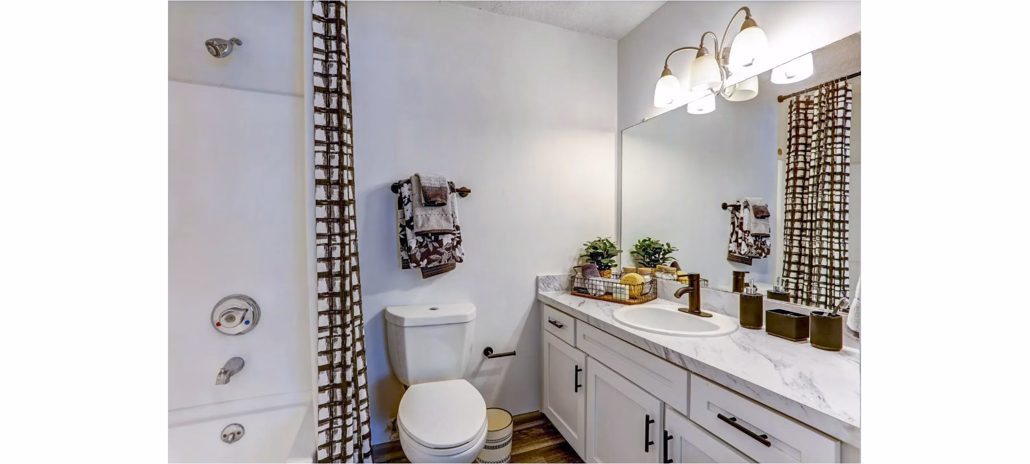 Bathroom with modern fixtures and sleek design at The Oakley Apartments
