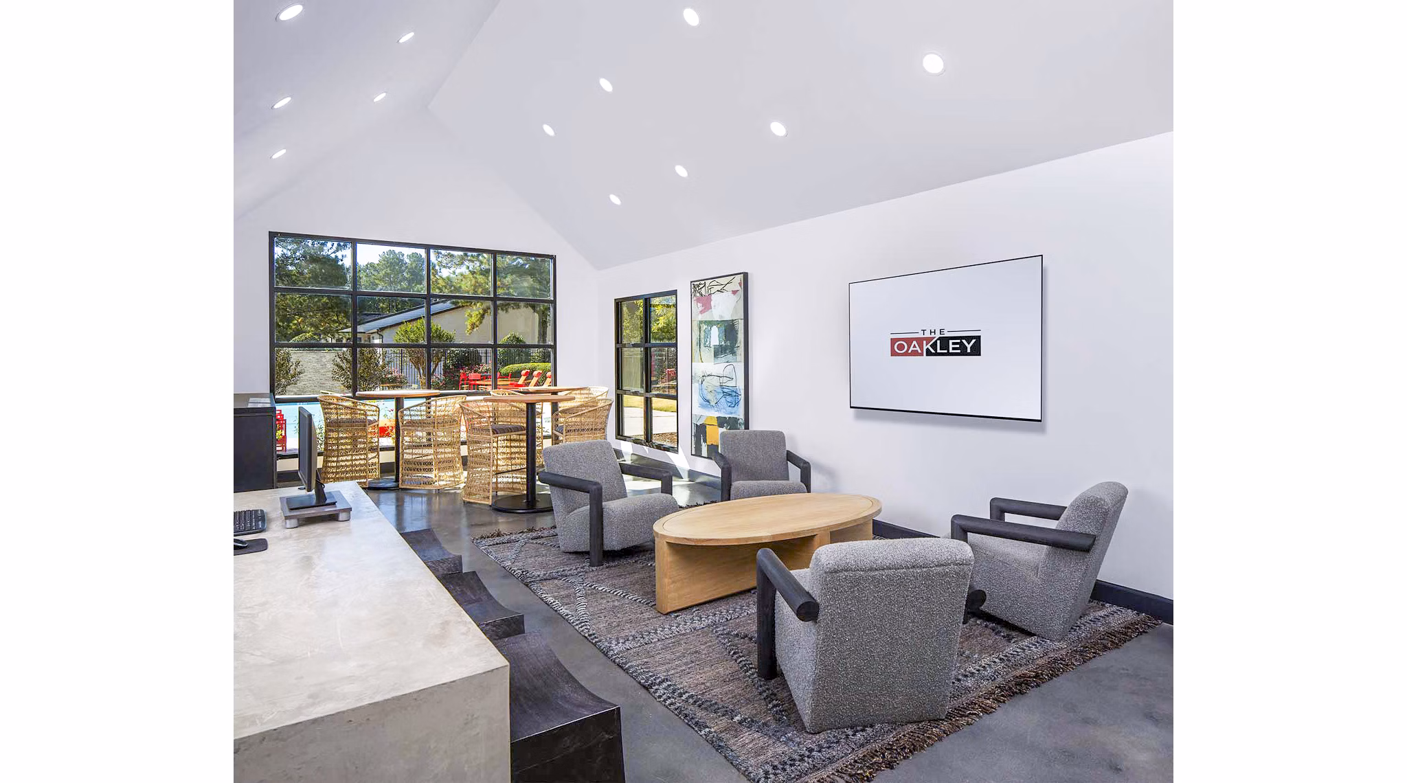 Clubhouse at The Oakley Apartments featuring modern design and ample seating areas Ideal for events and social gatherings in a luxurious setting