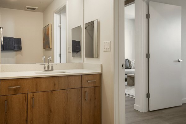 Modern bathroom with sleek fixtures at Encanto at Mesa Del Sol Apartments