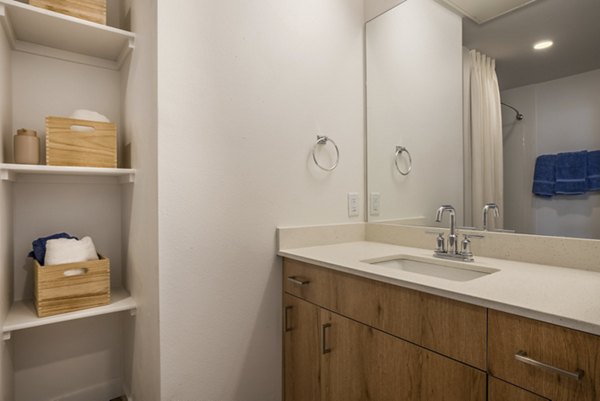 Modern bathroom with sleek fixtures at Encanto at Mesa Del Sol Apartments