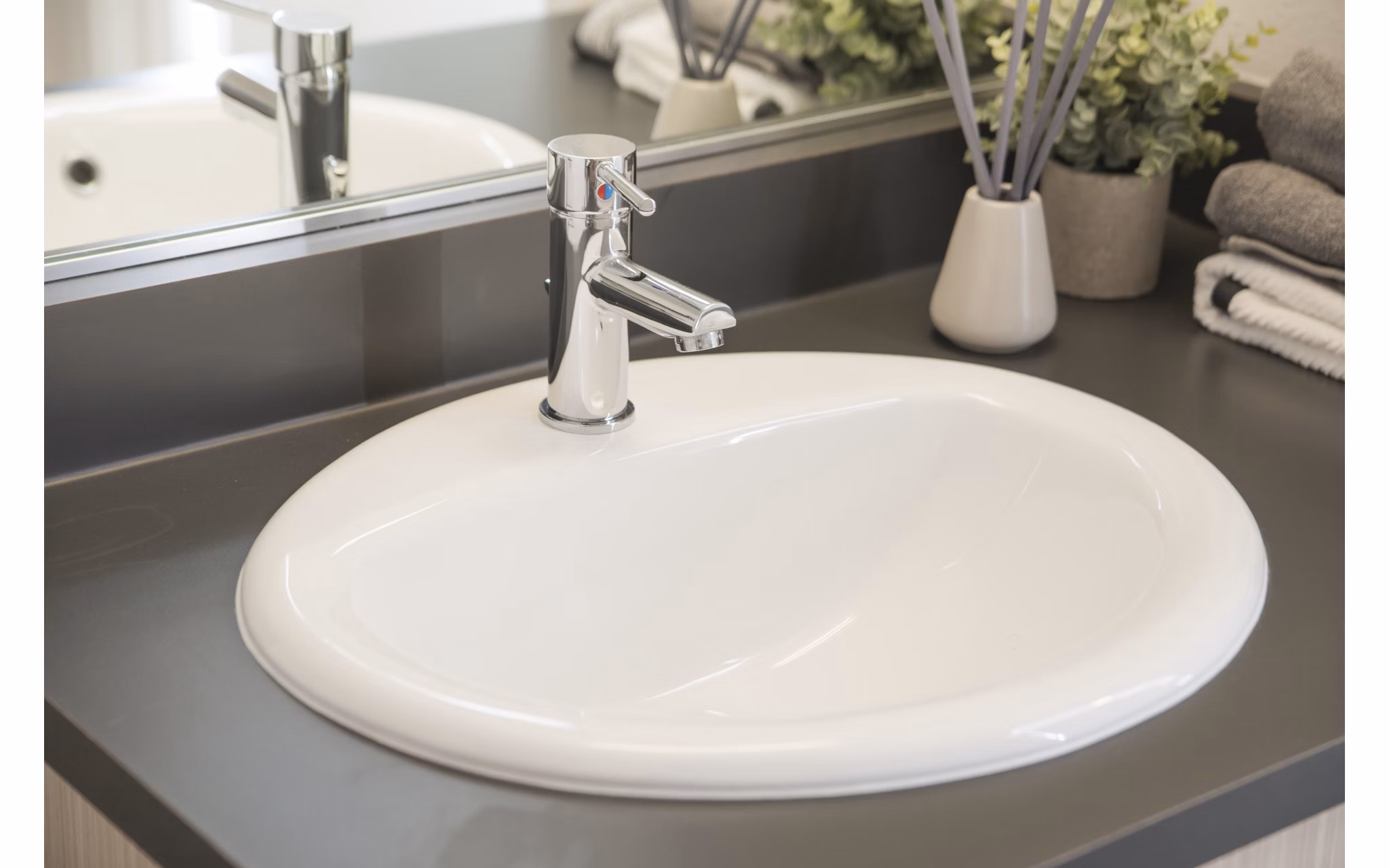 Contemporary bathroom with sleek fixtures at The Parsonage Apartments, offering luxury and modern design for residents