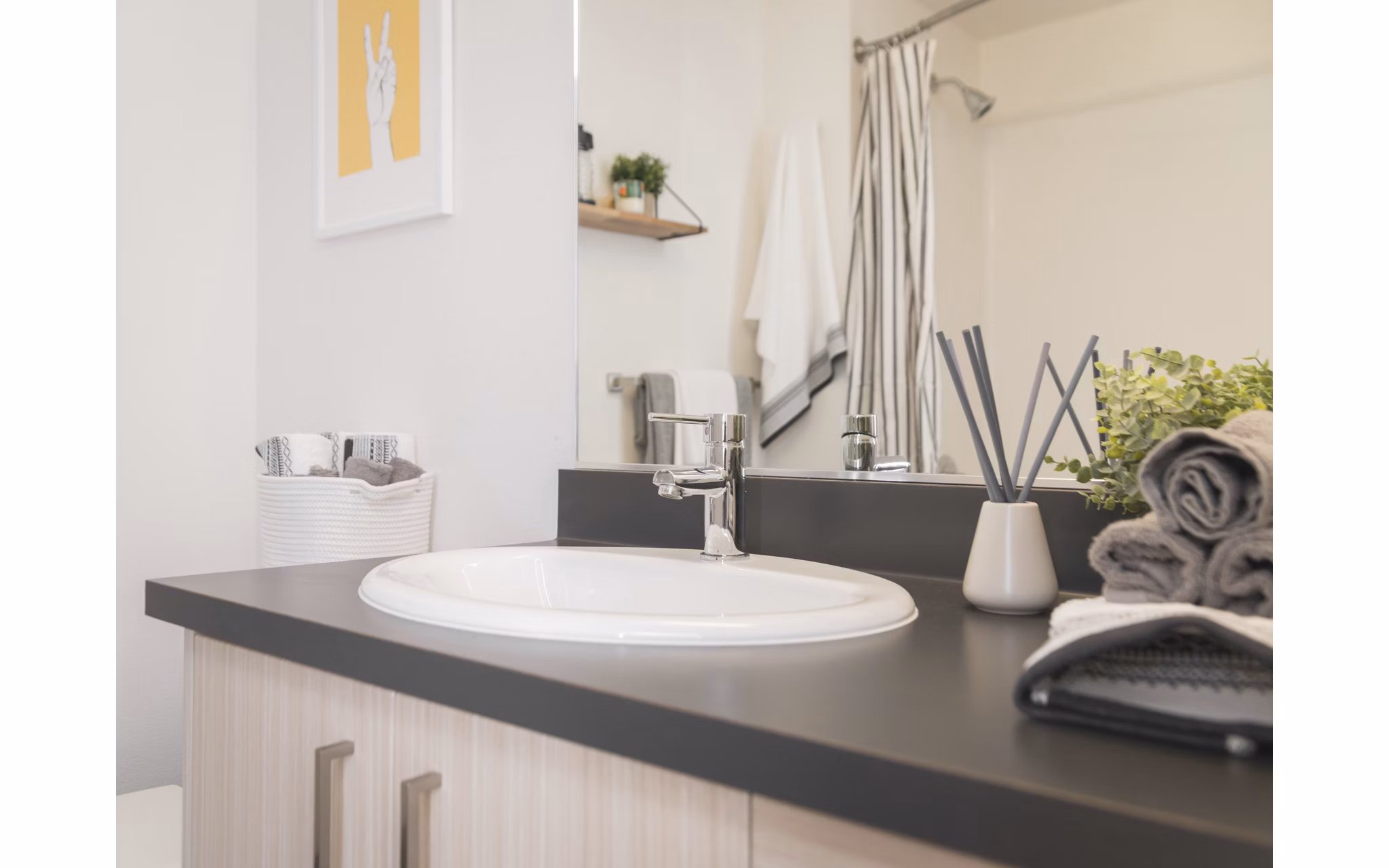 Modern bathroom featuring sleek design and marble countertops at The Parsonage Apartments