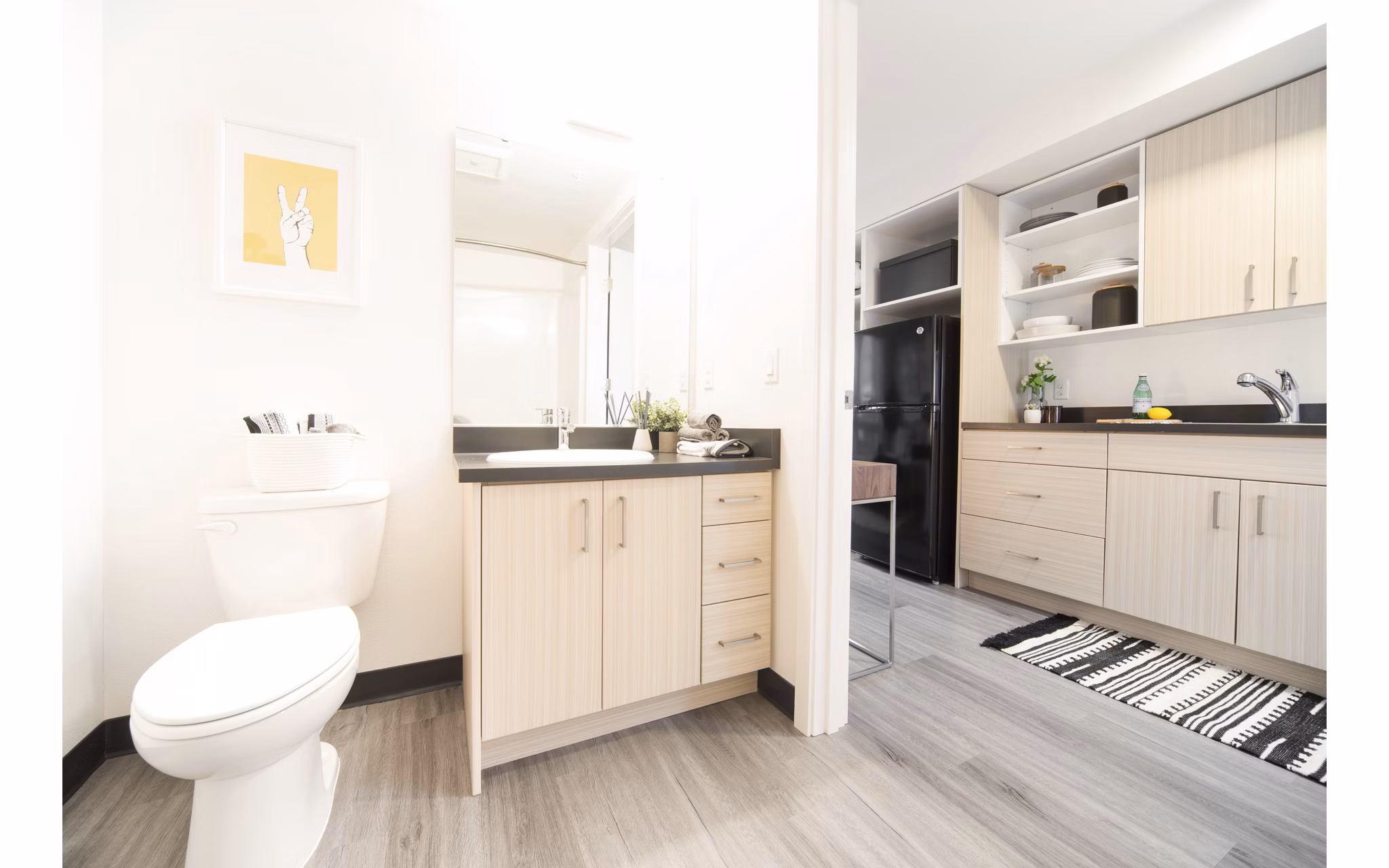 Luxurious bathroom featuring marble countertops and modern fixtures at The Parsonage Apartments