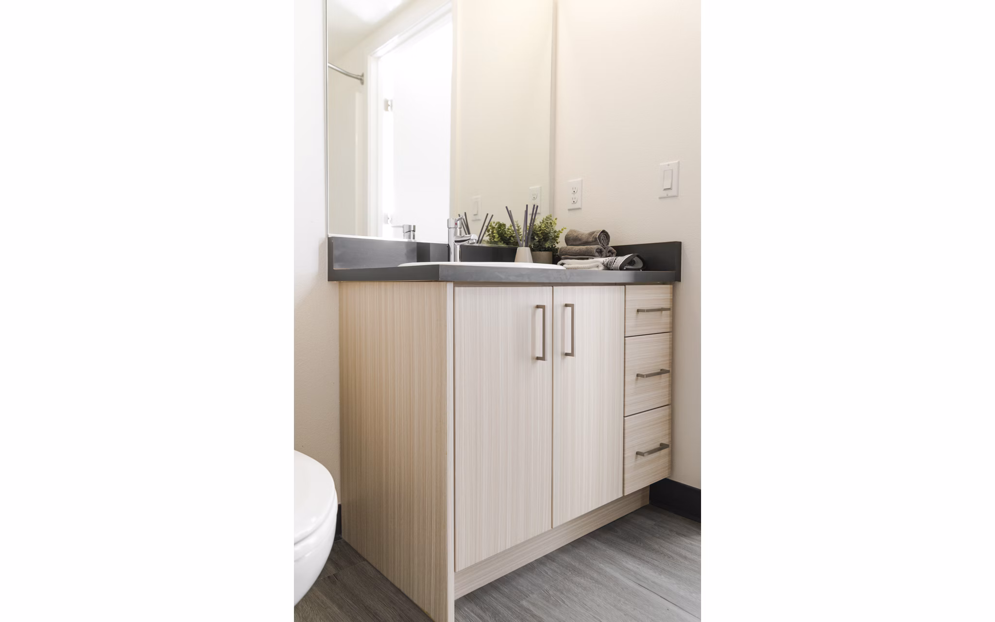 Spacious bathroom with modern fixtures at The Parsonage Apartments