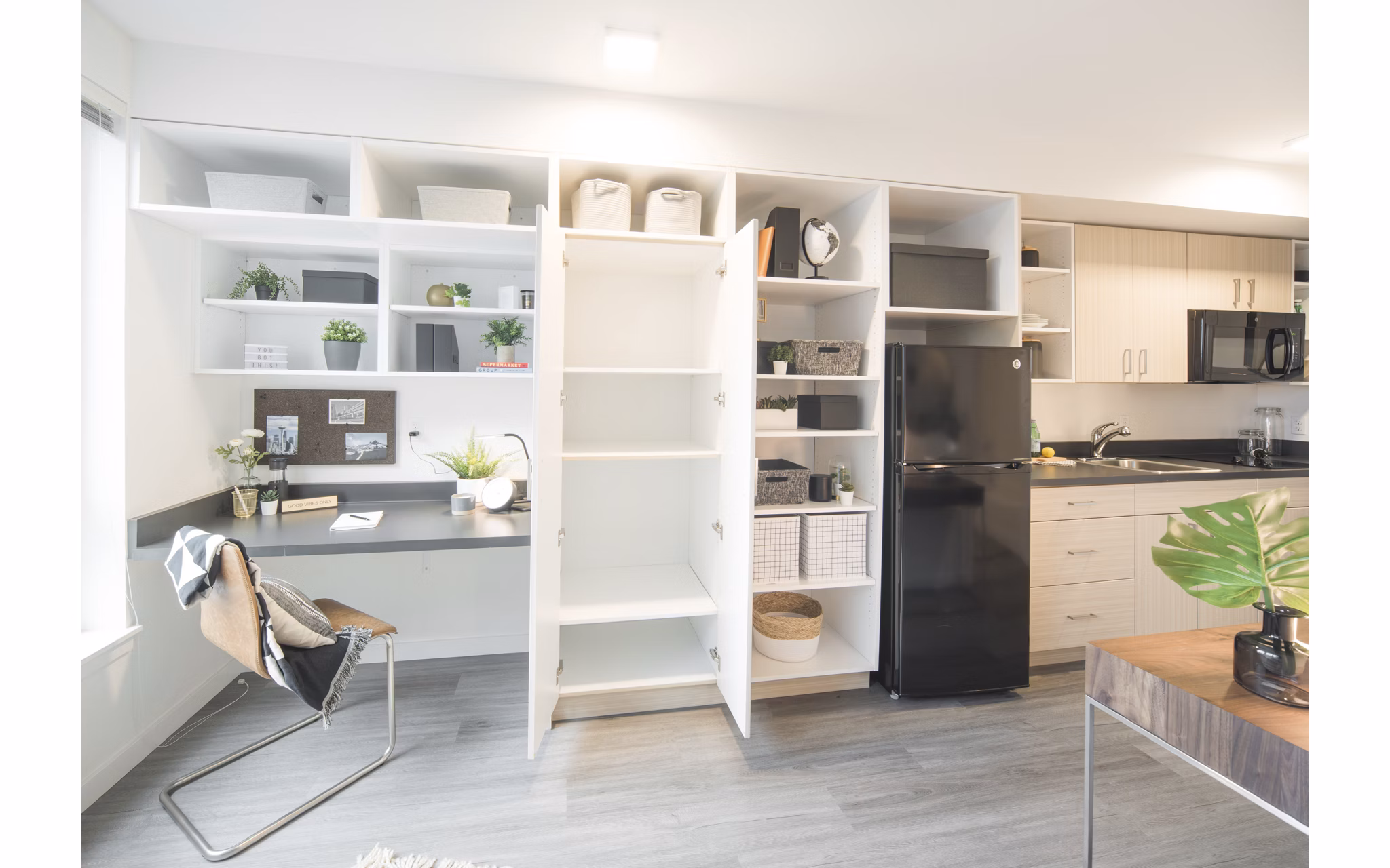 Modern kitchen with stainless steel appliances in The Parsonage Apartments