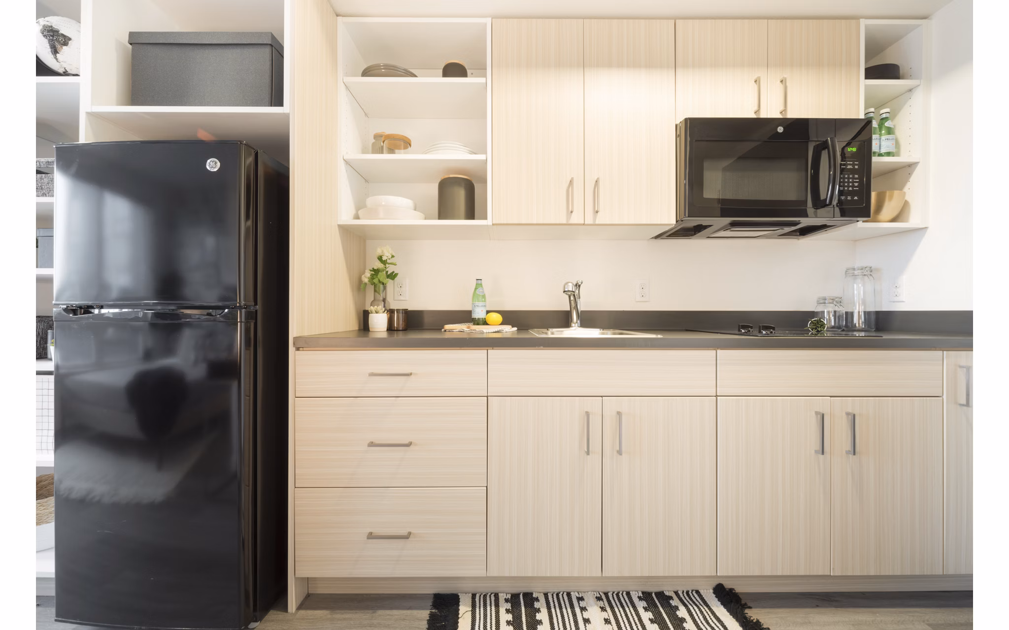 The Parsonage Apartments: Modern kitchen with stainless steel appliances and sleek countertops