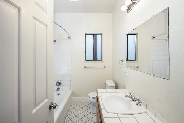 Modern bathroom with sleek fixtures at 1000 Chestnut Apartments