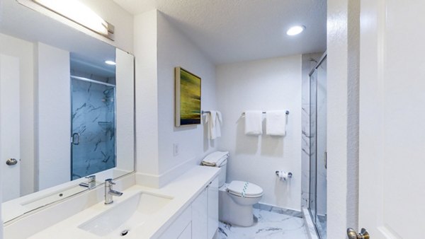 Luxury bathroom featuring elegant fixtures at 1000 Chestnut Apartments