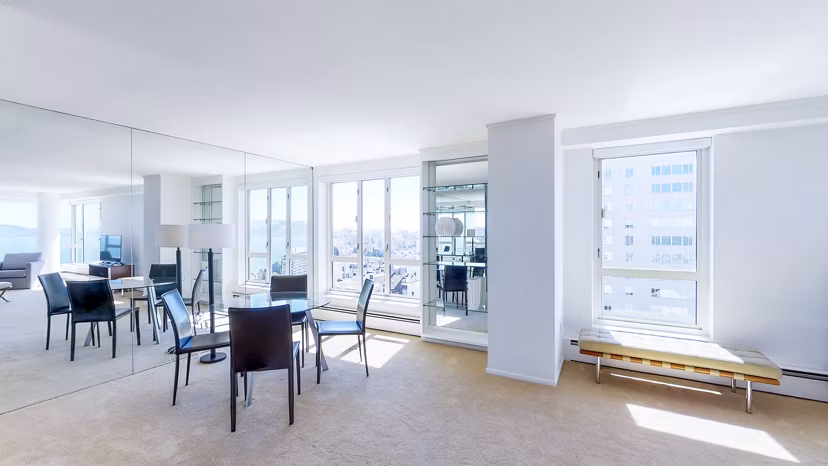 Dining room with city views at 1000 Chestnut Apartments in San Francisco