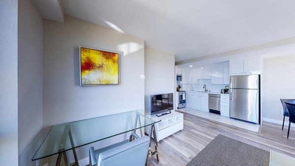 Spacious living room featuring modern decor at 1000 Chestnut Apartments luxury residences