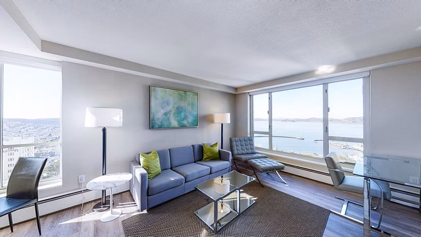 Elegant living room with modern furniture and bay views at 1000 Chestnut Apartments, luxurious living in San Francisco