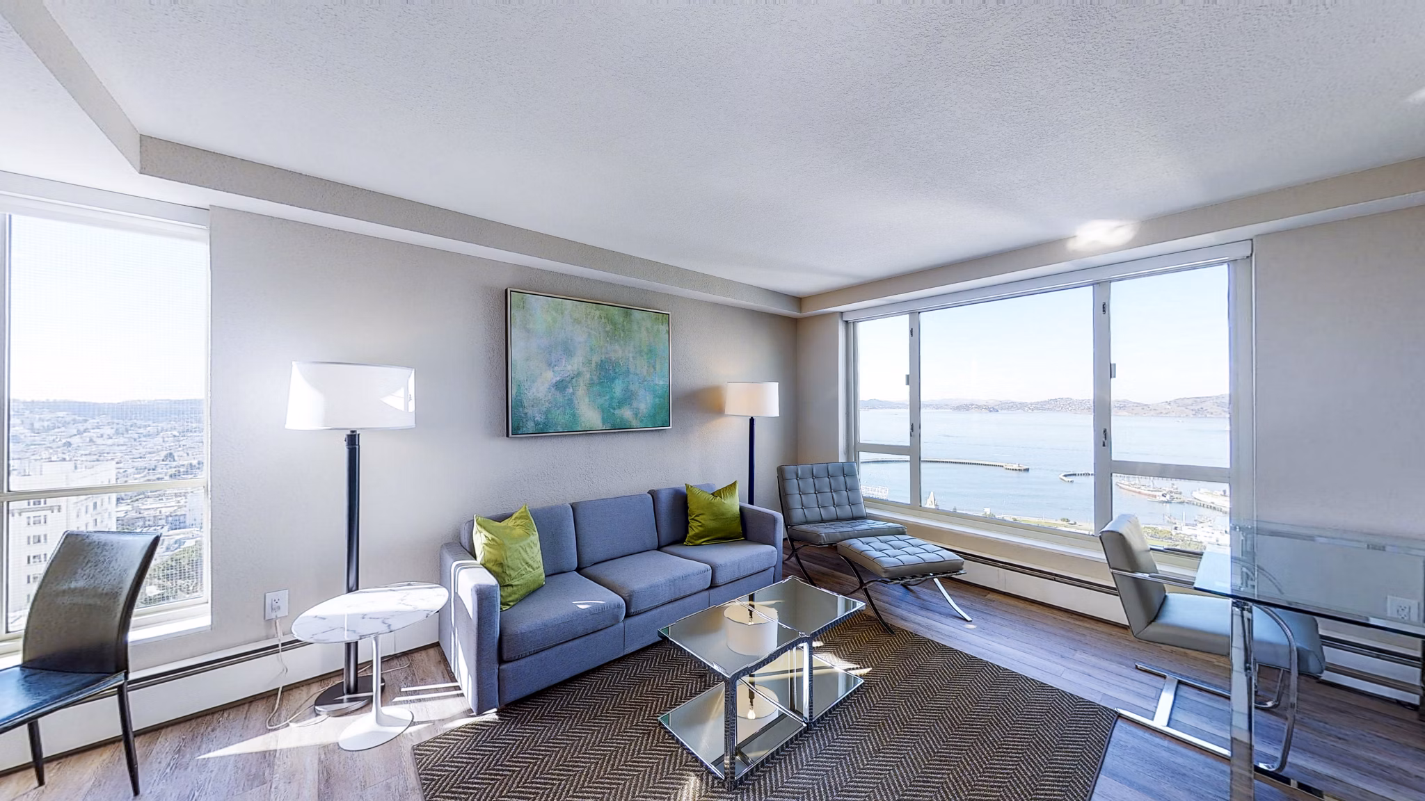 Elegant living room with modern furniture and bay views at 1000 Chestnut Apartments, luxurious living in San Francisco