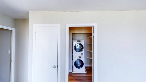 laundry room at 1000 Chestnut Apartments