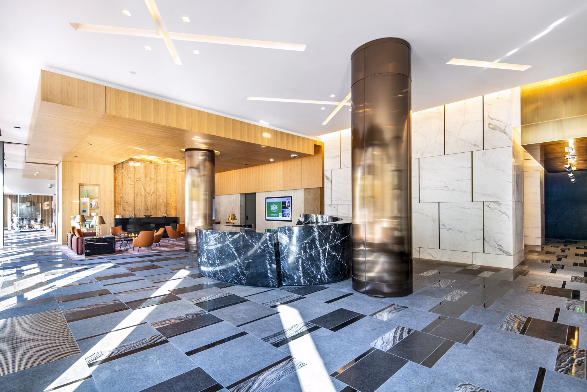 Clubhouse lobby with modern furnishings at 1177 Market Apartments, a Greystar luxury community