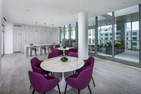 Clubhouse with modern design and cozy seating at 1177 Market Apartments, a luxury Greystar property in vibrant city center