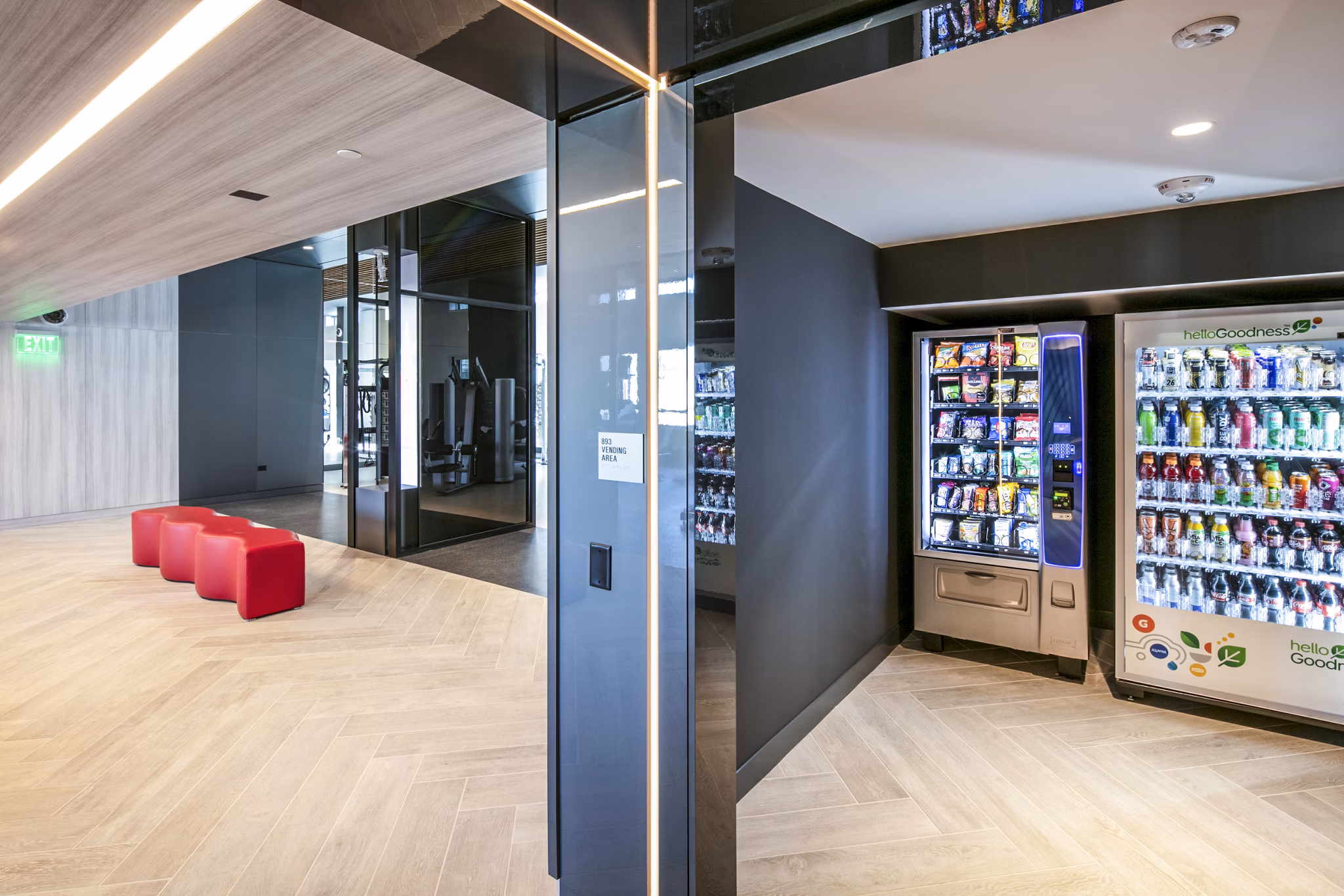 Modern fitness center with vending machines at 1177 Market Apartments