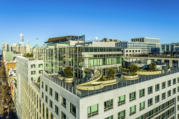 Spacious patio with modern furnishings at 1177 Market Apartments, offering city views from a luxury balcony in a premier location