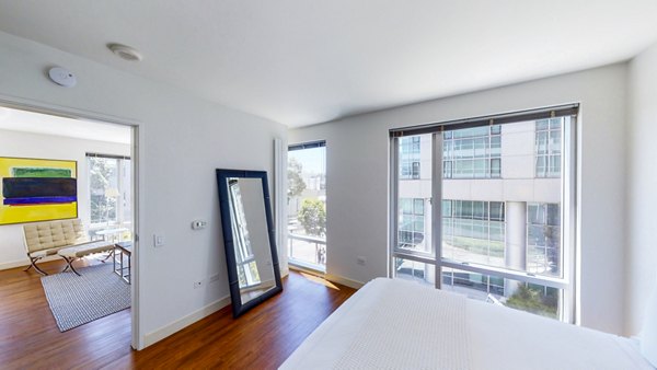 Cozy bedroom with modern design elements at 1188 Mission Apartments in San Francisco