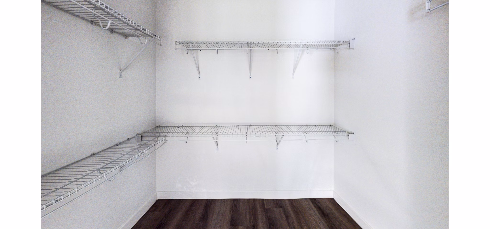 Bedroom closet with ample storage space in 1188 Mission Apartments