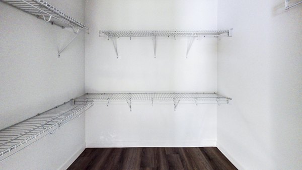Bedroom closet with ample storage space in 1188 Mission Apartments
