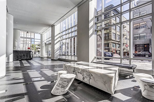 Modern clubhouse lobby with elegant seating area at 1188 Mission Apartments