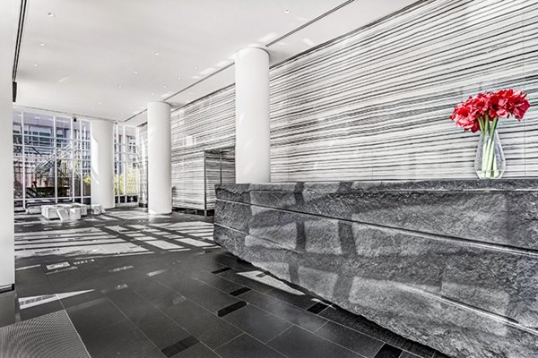 Clubhouse lobby with modern seating and decor at 1188 Mission Apartments