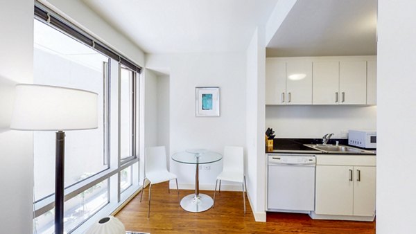 Dining area with modern decor in 1188 Mission Apartments, a luxury Greystar community in San Francisco