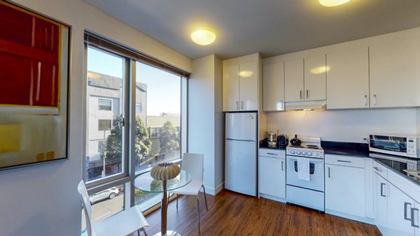 Dining room with stylish modern decor at 1188 Mission luxury apartments