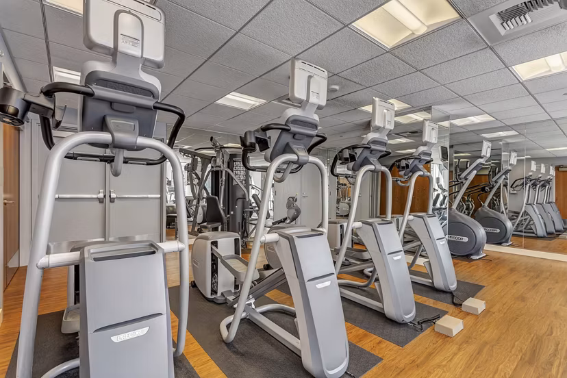 Fitness center equipped with modern gym equipment at 1188 Mission Apartments