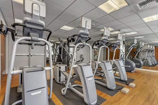 Fitness center equipped with modern gym equipment at 1188 Mission Apartments